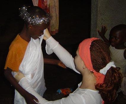 Dressing up an orphan boy to perform nativity skit