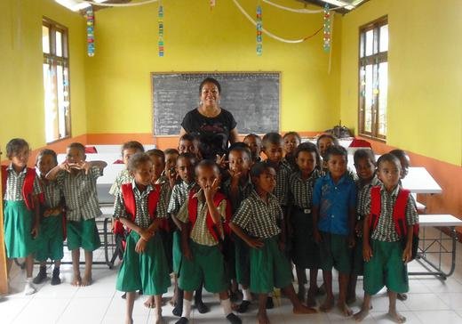 Angel with school children at the Atambua School in Timor.