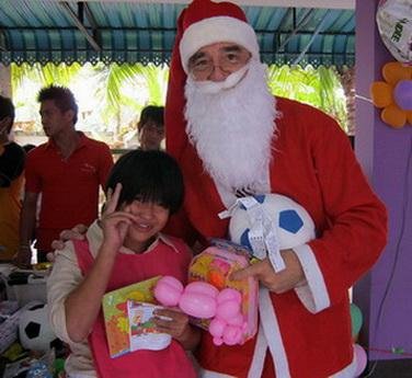 TFI volunteer Victor as Santa Clause for the children’s Christmas program in Thailand.