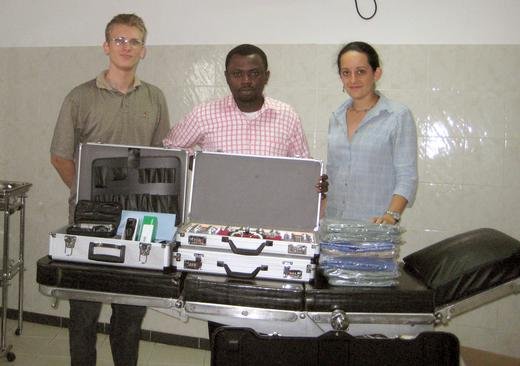 Andrew, Dr.Daniel and Elene with medical equipment for Ikota Clinic
