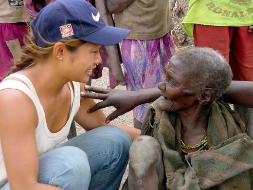 Cele and a 100-year-old grandmother who had just received the Lord, Uganda