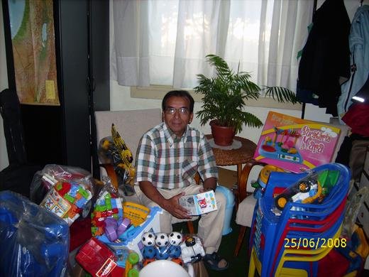 Daniel with donated toys for the new children's room in Otelu Rosu hospital, Romania