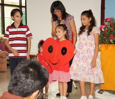 TFI member Diane with the kids doing a skit at the Bahn Bang Kae Senior Citizen’s Home for Songkran