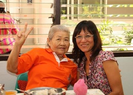 TFI member Diane with a happy resident at the Bahn Bang Kae Senior Citizen’s Home on Songkran (Thai New Year).