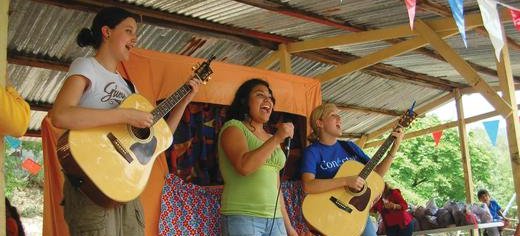 FI_volunteers_lead_the_audience_in_happy_singing.JPG