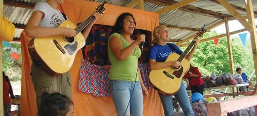 FI_volunteers_lead_the_audience_in_happy_singing.JPG