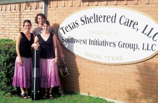 Family volunteers performing at Texas Sheltered Care in the USA