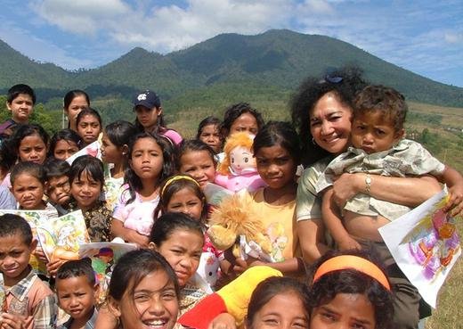 Francis, a volunteer with TFI, with children at a remote school on Flores Island, East Indonesia.