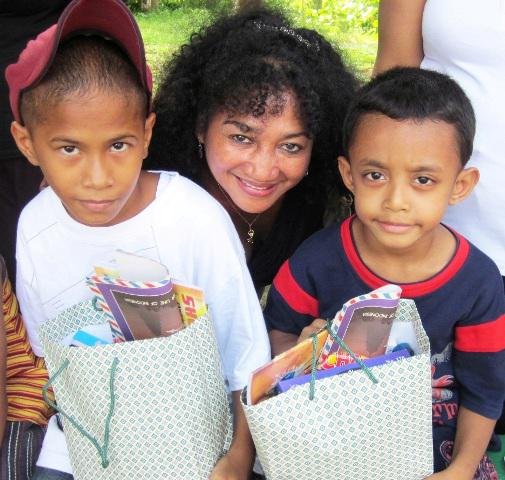 School children on Serim Island, East Indonesia, with Francis, a TFI volunteer.