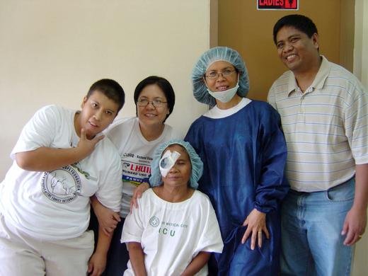 Grace with two of our sponsors after an eye operation, Philippines