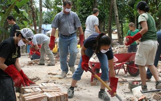 TFI volunteers helping with the Jogja earthquake clean up efforts.