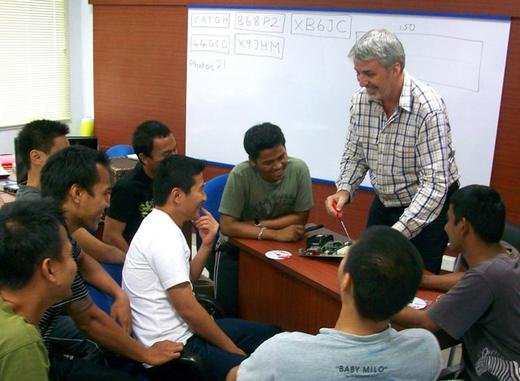 John, a volunteer with TFI, teaching at a drug rehabilitation center in Indonesia.