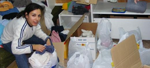 Luminita_preparing_packages_for_an_event_for_100_poor_families_Romania.JPG