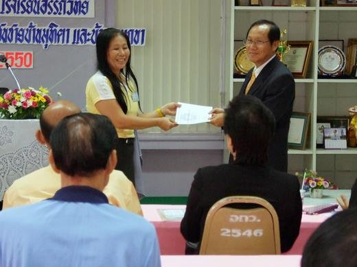 Mayuree receiving an award in the name of The Family from the Thai Government of Thailand