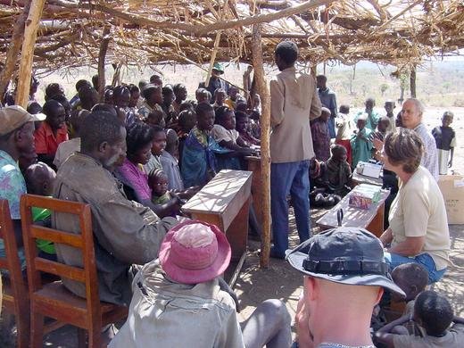 Introducing donated tape recorders to the Ik Tribe in Uganda