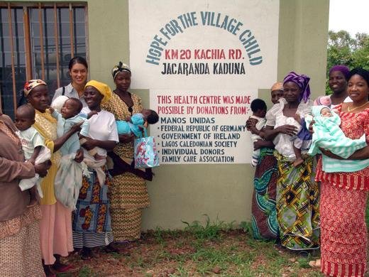 Family volunteer Rima with mothers at the AIDS-prevention health center, Nigeria