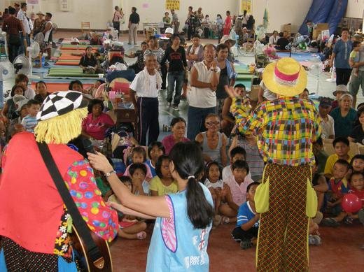 Performance by Family volunteers brings encouragement and hope to typhoon victims