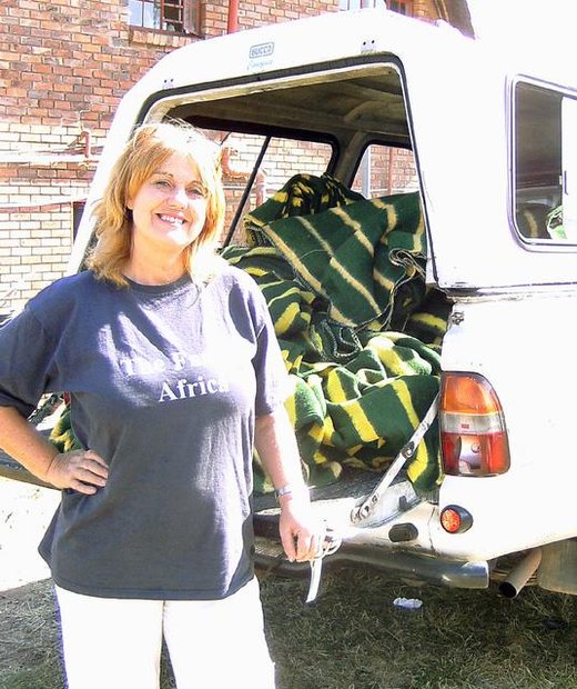 Rachel preparing to deliver donated blankets to the refugee camp in Midrand