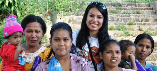 Sharon, TFI member with new mothers in Flores