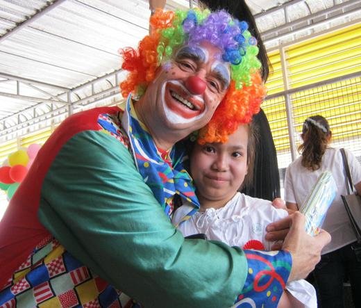 Victor giving a hug at a children’s hospital