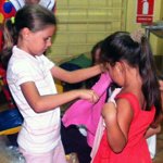 _thumbnail_Distributing_new_clothes_and_toys_to_children.jpg