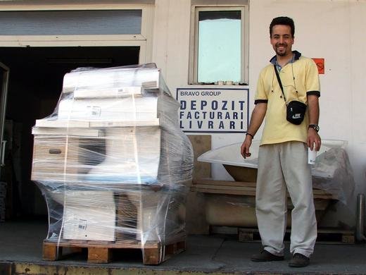 Family volunteer with donated toilets